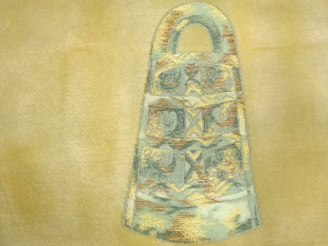 アンティーク　銅鐸模様織り出し名古屋帯