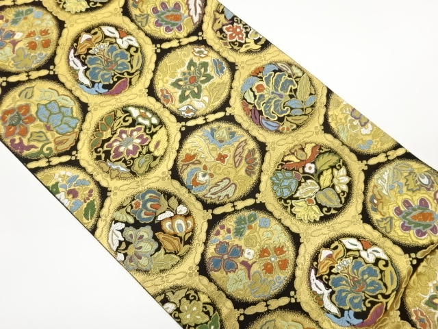 京藝製　変わり亀甲に丸文・花々模様織出し袋帯