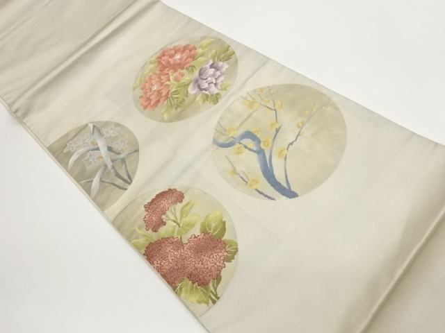 丸に草花模様織出し袋帯