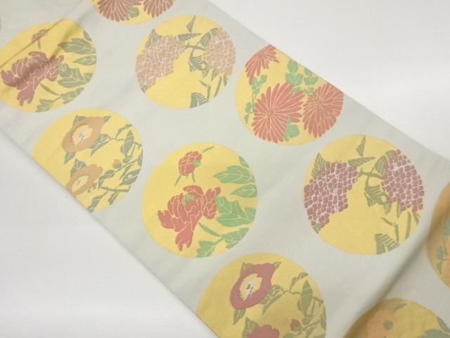丸に草花模様織出し名古屋帯