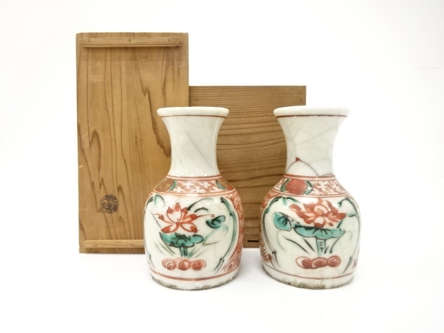 A pair of red-painted sake cups made by Eiraku Zengoro (Shozen XV), the tenth ge